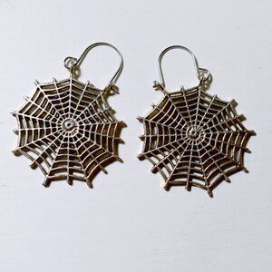 Large silver spiderweb dangle earrings from Witching Hour Baby